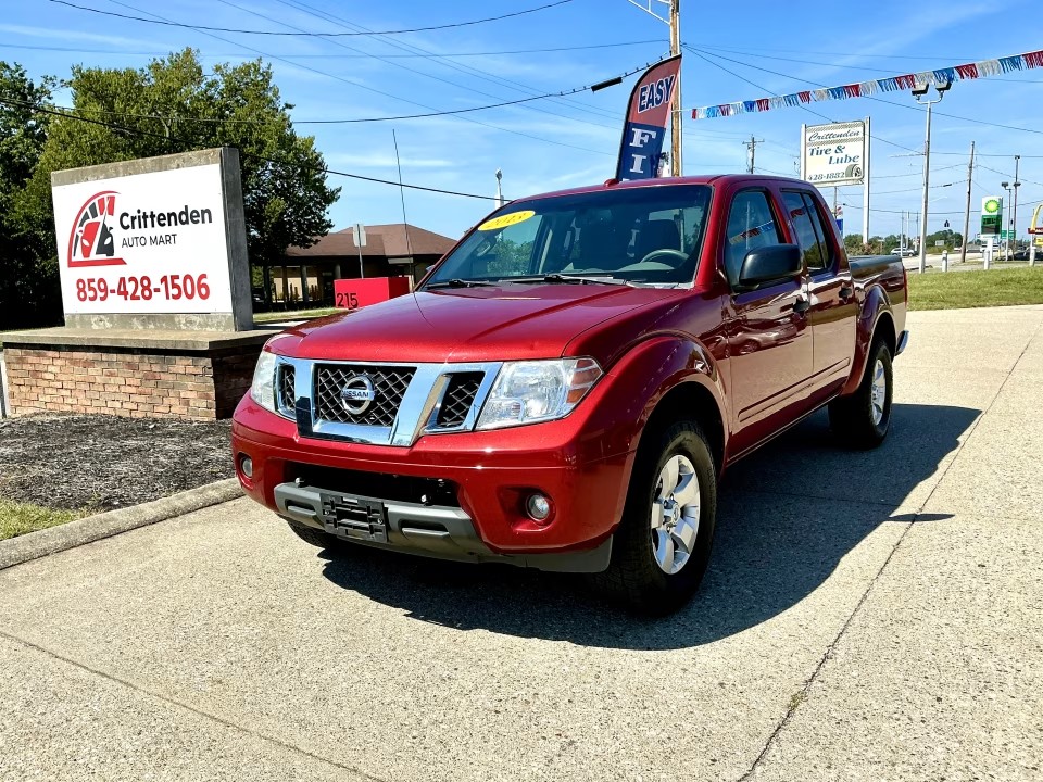 Red 2013 Nissan Frontier Pickup Truck Four-Wheel Drive 5-Speed Automatic