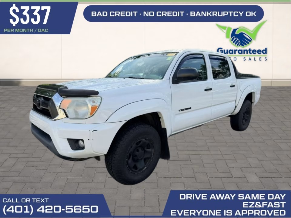 White 2012 Toyota Tacoma Pickup Truck Four-Wheel Drive 6-Speed Manual
